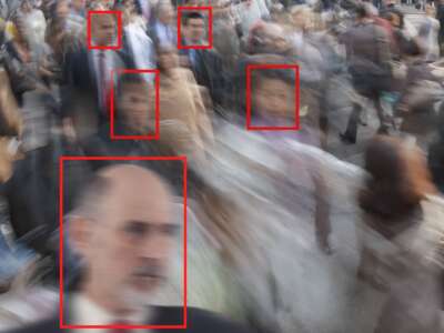 Facial recognition used on pedestrians in a crowd