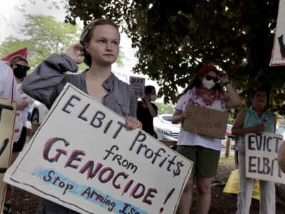 Members of BDS Boston protest outside the Cambridge, Massachusetts, offices of Elbit Systems, a company that does work for the Israeli military, on June 12, 2024.