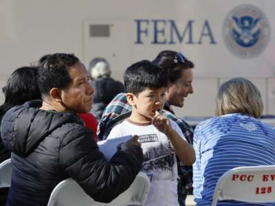 Wildfire victims seek disaster relief services at one of two FEMA Disaster Recovery Centers at the Pasadena City College Community Education Center in Pasadena, California, on January 14, 2025.