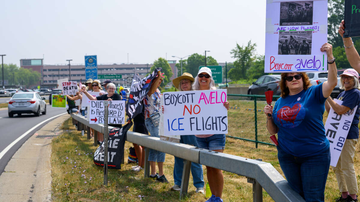 A rally near the Albany International Airport along Albany Shaker Road on July 26, 2025, in Colonie, New York. Protesters called on Albany County to drop Avelo Airlines from the airport roster because of its participation in ICE deportation flights.