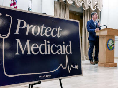 Rep. Mike Levin holds a town hall meeting with constituents at the Sea Country Senior and Community Center in Laguna Niguel, California, on August 21, 2025, to discuss the impacts of the Republican budget law on health care and other programs.