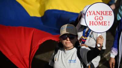 A woman attends a march to demand the release of kidnapped Venezuelan President Nicolás Maduro and his wife Cilia Flores, in Caracas, Venezuela, on January 8, 2026.