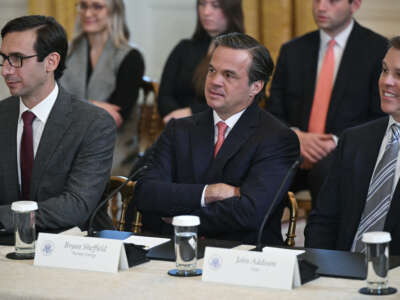 (L/R) Raisa Energy CEO Luis Rodriguez, Bryan Sheffield of Formentera Partners and Vitol executive John Addison look on as U.S. President Donald Trump hosts a meeting with U.S. oil company executives in the East Room of the White House in Washington, D.C., on January 9, 2026.