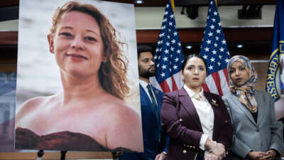 Representatives Maxwell Frost, Delia Ramirez, and Ilhan Omar conduct a news conference on funding and accountability for the Department of Homeland Security alongside an image of Renee Nicole Good on January 13, 2026, in Washington, D.C.