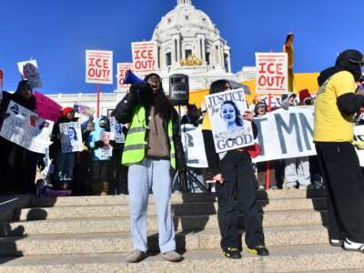High school students gather for an anti-ICE protest outside the State Capitol in St. Paul, Minnesota, to call for an end to federal immigration detentions and enforcement actions on January 14, 2026.