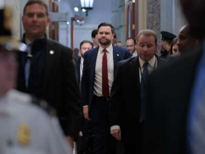 U.S. Vice President J.D. Vance arrives at the U.S. Capitol before casting a tie-breaking vote to block a Venezuela war powers resolution on January 14, 2026, in Washington, D.C.