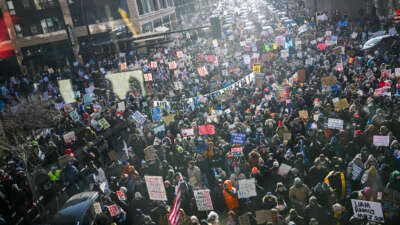 Demonstrators participate in a rally and march during an "ICE Out” day of protest on January 23, 2026, in Minneapolis, Minnesota.