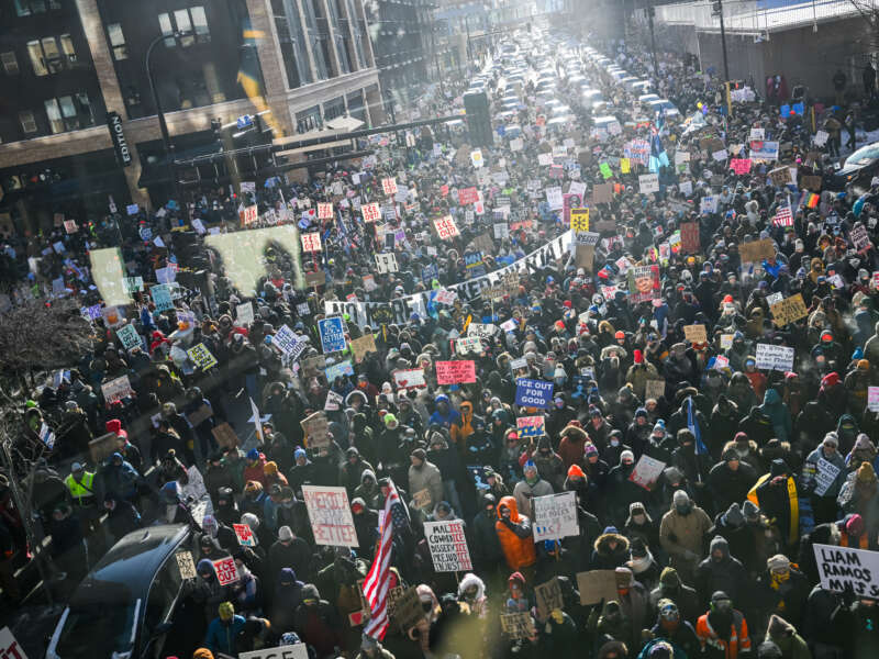 Demonstrators participate in a rally and march during an "ICE Out” day of protest on January 23, 2026, in Minneapolis, Minnesota.