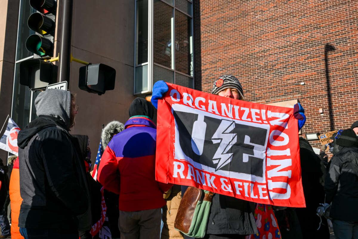 Demonstrators participate in a rally and march during an "ICE Out” day of protest and general strike on January 23, 2026, in Minneapolis, Minnesota.