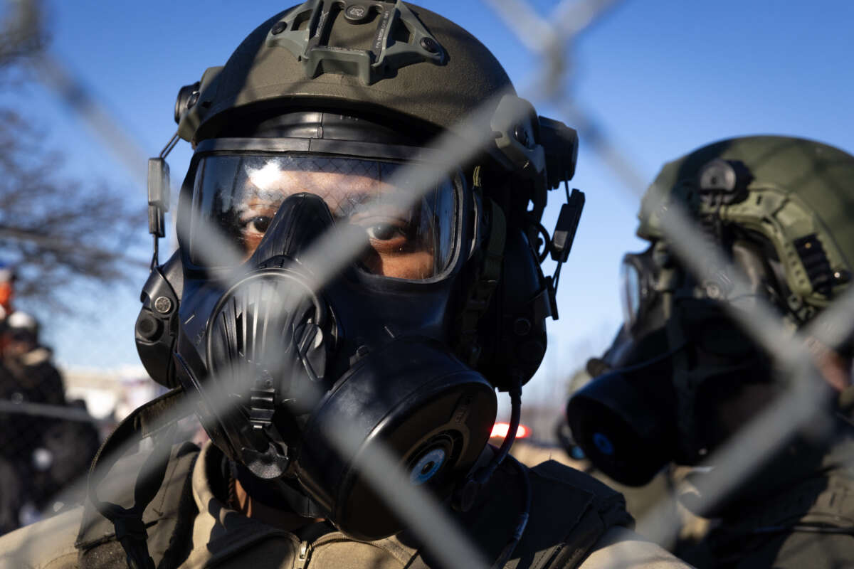 Police confront demonstrators participating in a protest at the Whipple federal building organized by religious leaders calling for an end to ICE operations in Minnesota on January 30, 2026, in Minneapolis, Minnesota.