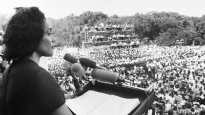 Coretta Scott King addresses the "Solidarity Day" rally of the Poor People's Campaign from the steps of the Lincoln Memorial in Washington, D.C., on June 19, 1968.