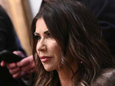 Secretary of Homeland Security Kristi Noem listens as President Donald Trump hosts a cabinet meeting in the Cabinet Room of the White House in Washington, D.C., on January 29, 2026.