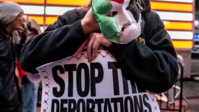 Demonstrators gather in Times Square in solidarity and to demand the release of detained Columbia University graduate student Mahmoud Khalil on April 12, 2025 in New York City.