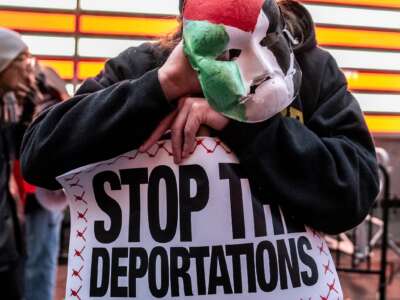 Demonstrators gather in Times Square in solidarity and to demand the release of detained Columbia University graduate student Mahmoud Khalil on April 12, 2025 in New York City.