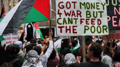 Pro-Palestinian activists protest the genocide in Gaza on its anniversary at the Newscorp headquarters on October 7, 2025 in New York City.