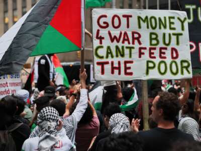 Pro-Palestinian activists protest the genocide in Gaza on its anniversary at the Newscorp headquarters on October 7, 2025 in New York City.
