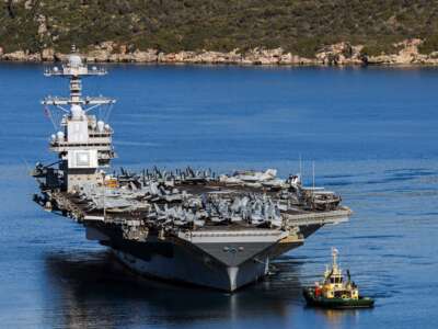 The U.S. Navy aircraft carrier USS Gerald R. Ford departs Souda Bay on the island of Crete on February 26, 2026.