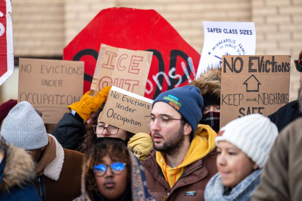 Members of the Minneapolis Federation of Educators and their allies protest the state government’s inaction on housing instability during Operation Metro Surge.