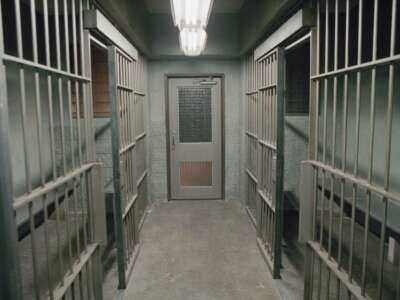 Row of empty prison cells