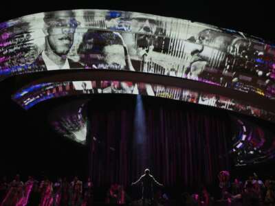 Performers take part in a dress rehearsal of X: The Life and Times of Malcolm X at the Metropolitan Opera in New York City on October 31, 2023. This musical biography of civil rights leader Malcolm X infuses history with Afrofuturism, and first premiered in the mid-1980s to favorable reviews from critics, but went unrevived for decades, with just a few stagings over nearly 40 years.