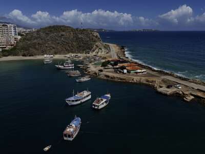 Aerial view of Pier Juan Griego in Margarita Island, Nueva Esparta State, Venezuela, on November 25, 2024. A blockchain-based residential settlement called CryptoCity spans 35 hectares on Margarita Island and is promoted to German and other foreign investors as a highly exclusive enclave.