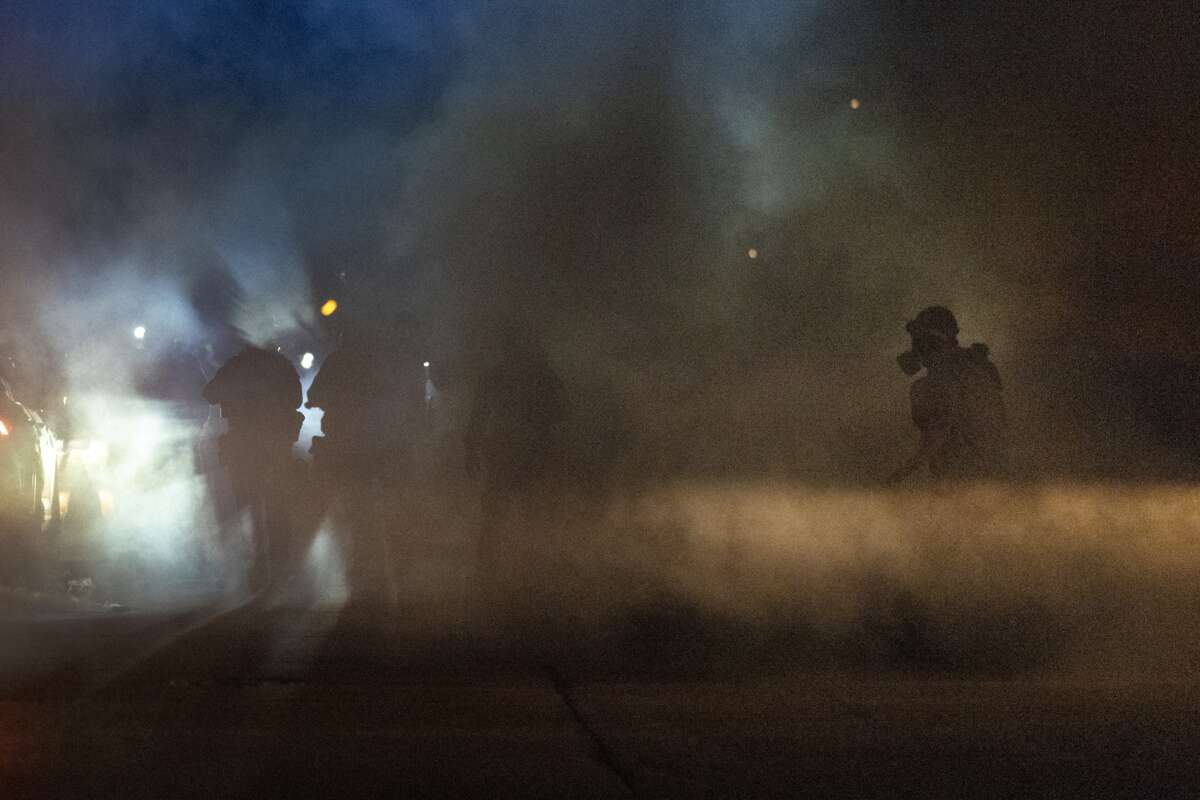 Federal agents attack demonstrators protesting outside of an immigrant jail with a barrage of tear gas and pepper balls on September 27, 2025, in Broadview, Illinois.