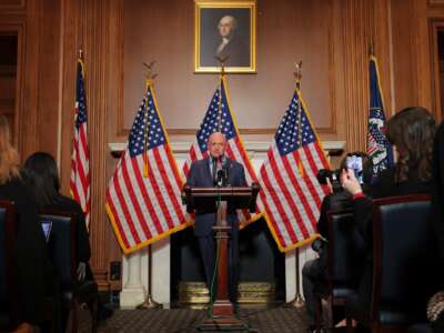 Sen. Mark Kelly (D-Arizona) speaks at a news conference in the U.S. Capitol on December 1, 2025, in Washington, D.C. Kelly held the event to address what he described as intimidating actions by President Donald Trump and Secretary of Defense Pete Hegseth, following a video in which Kelly and several lawmakers urged U.S. troops to refuse illegal orders.