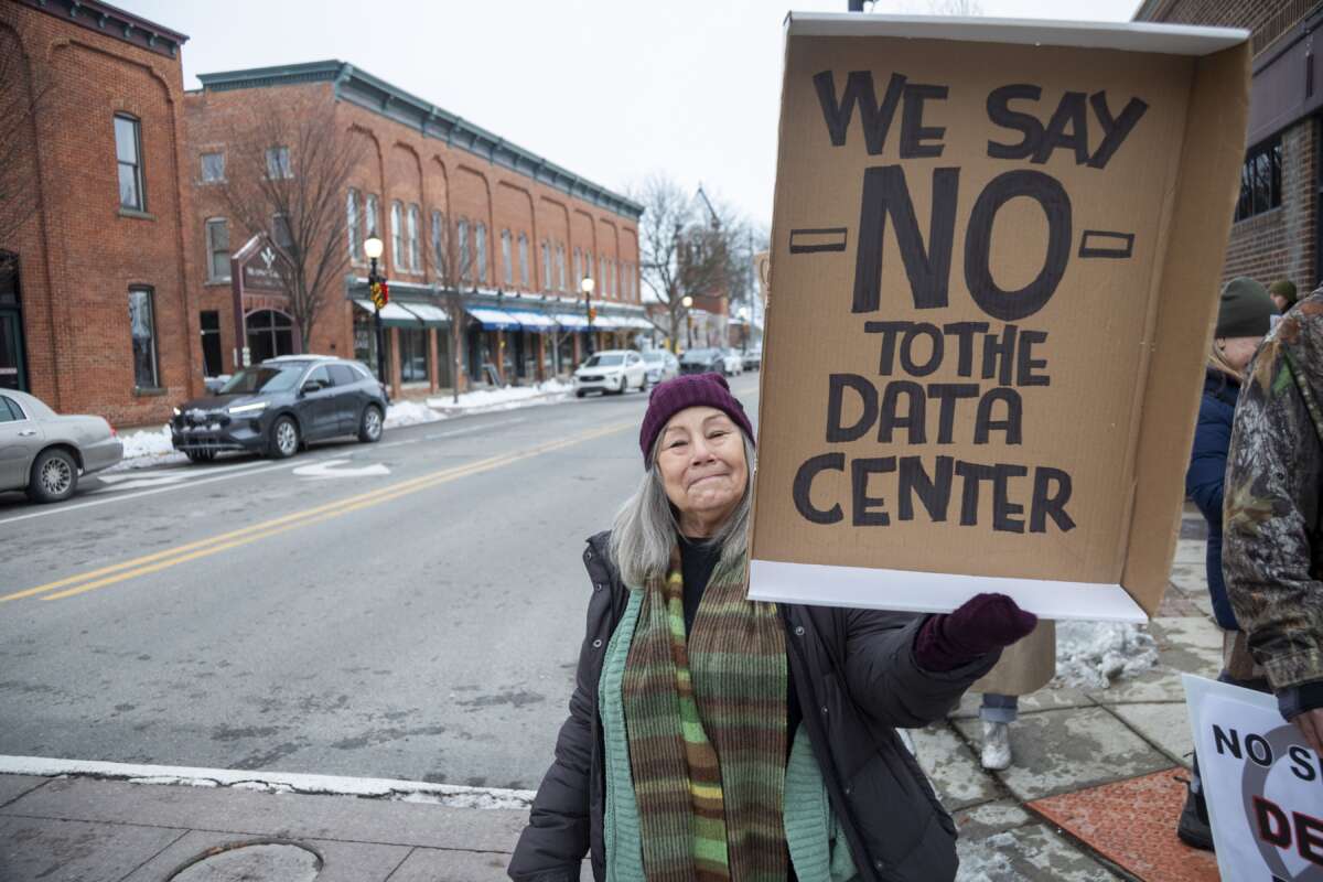 Rural Michigan residents rally against the $7 billion Stargate data center planned on southeast Michigan farm land on December 1, 2025, in Saline, Michigan.