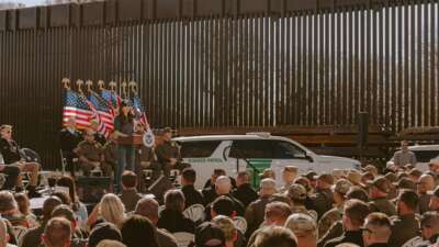 Homeland Security Secretary Kristi Noem speaks during a press conference near the border wall between the US and Mexico in Nogales, Arizona, on February 4, 2026.