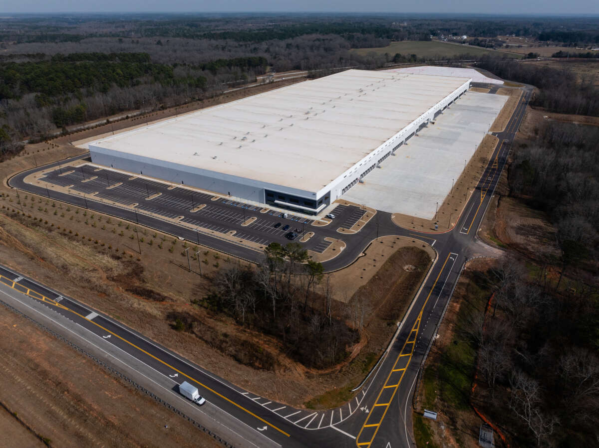 An industrial warehouse recently purchased by Immigration and Customs Enforcement (ICE) for use as a detention center is seen on February 10, 2026, in Social Circle, Georgia.