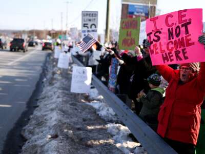 People protest against the planned project of converting a warehouse into a U.S. Immigration and Customs Enforcement (ICE) detention center in Roxbury, New Jersey, on February 16, 2026.