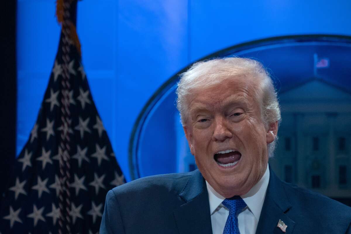 Donald Trump speaks to reporters during a news conference on tariffs at the White House on February 20, 2026, in Washington, D.C.