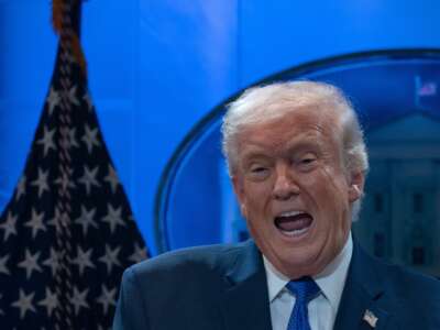 Donald Trump speaks to reporters during a news conference on tariffs at the White House on February 20, 2026, in Washington, D.C.