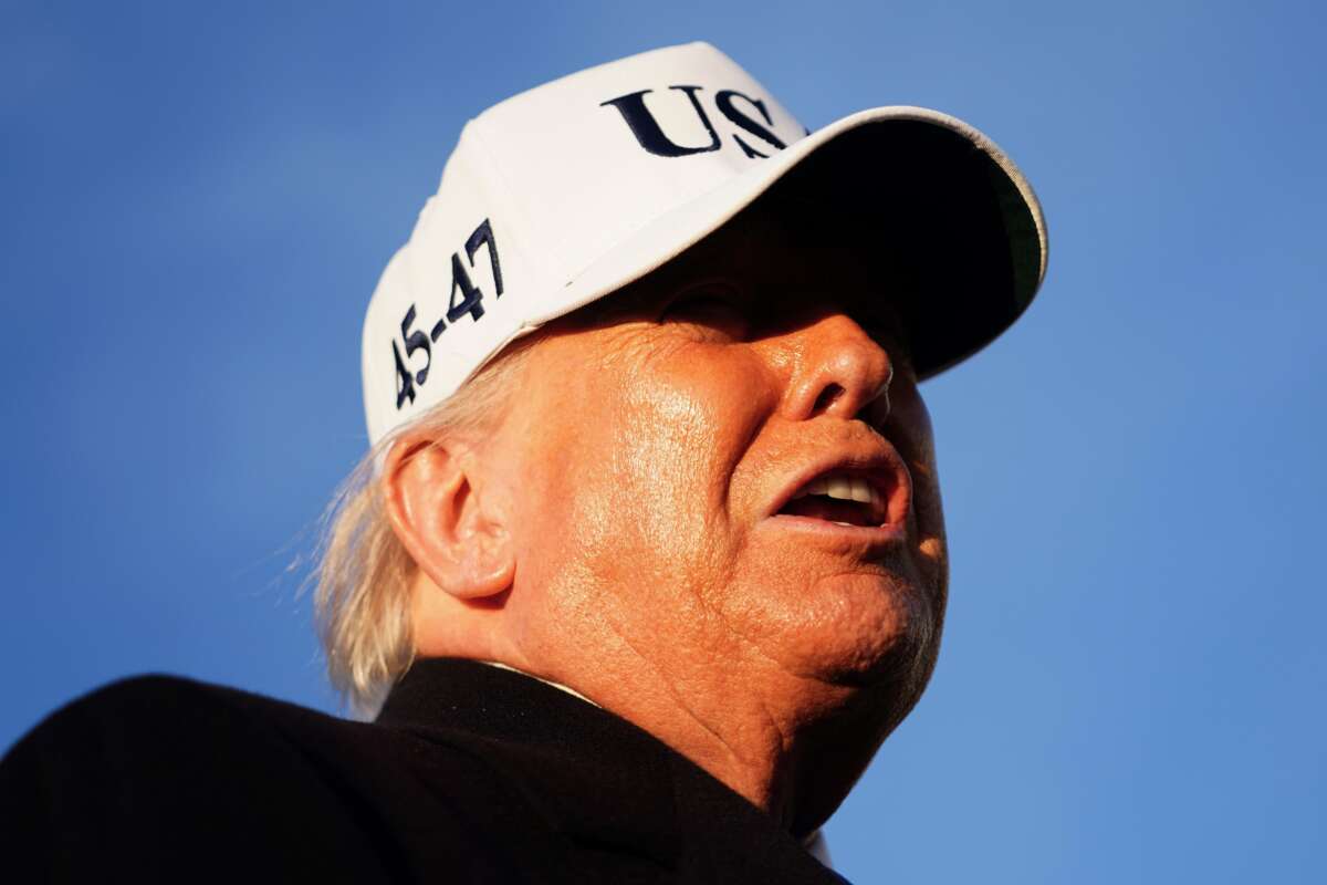 President Donald Trump speaks to the media before boarding Air Force One on March 13, 2026 at Joint Base Andrews, Maryland. Trump is traveling to Florida to spend the weekend at his Mar-a-Lago resort.