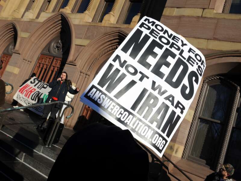 A rally was held in front of city hall in New Haven, Connecticut on March 1, 2026 to protest the bombing of Iran by the United States and Israel.