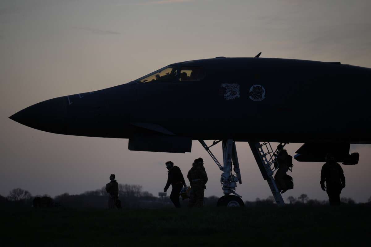 Flight crew board U.S. Air Force B-1B Lancer bombers as they prepare for take off at RAF Fairford, which the U.S. is using in relation to the war on Iran, on March 13, 2026 in Fairford, England.