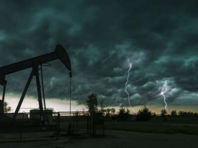 A stunning set of lightning bolts under a severe thunderstorm with an oil pump, taken near Edmond, Oklahoma, on March 21, 2020.