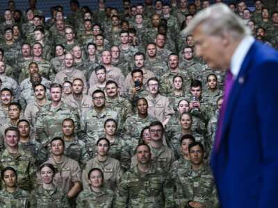 Donald Trump arrives to address troops at the Al Udeid Air Base southwest of Doha, Qatar, on May 15, 2025.
