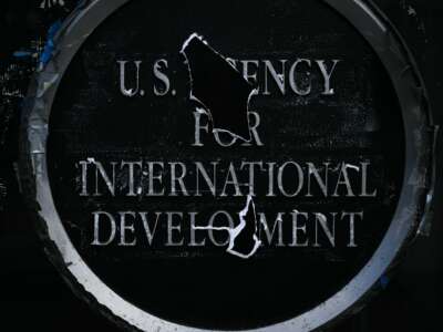 Remnants of signage for the US Agency for International Development (USAID) on the facade of the Ronald Reagan Building and International Trade Center building in Washington, D.C., on December 29, 2025.