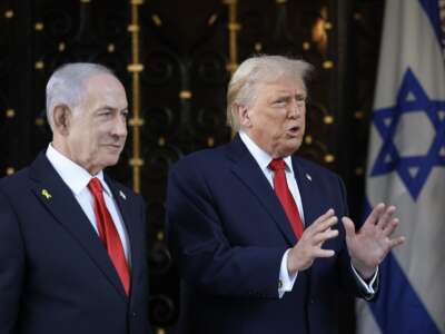 Donald Trump welcomes Israeli Prime Minister Benjamin Netanyahu to his Mar-a-Lago Club on December 29, 2025, in Palm Beach, Florida.