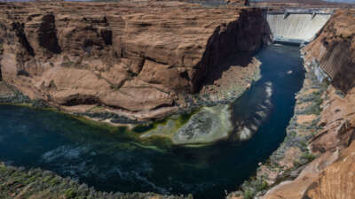 The Colorado River flows below the Glen Canyon Dam on April 18, 2023, in Page, Arizona.