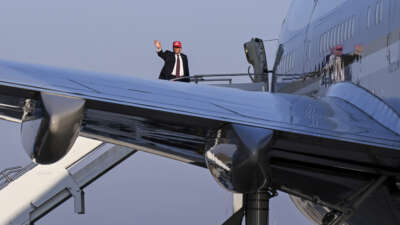 President Donald Trump waves before boarding Air Force One at Corpus Christi International Airport on February 27, 2026, in Corpus Christi, Texas.