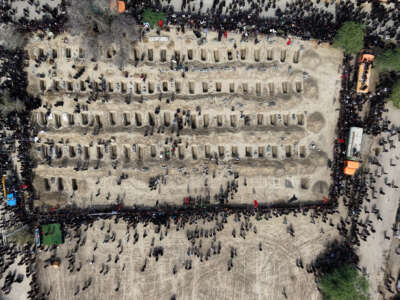 An aerial view of a graveyard as funerals are held for students and staff from a girls' school, who authorities said were killed in a US-Israeli strike on February 28, on March 3, 2026, in Minab, Iran.