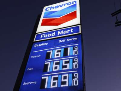 High gas prices are displayed at a Chevron station in downtown Los Angeles, California, on March 3, 2026.
