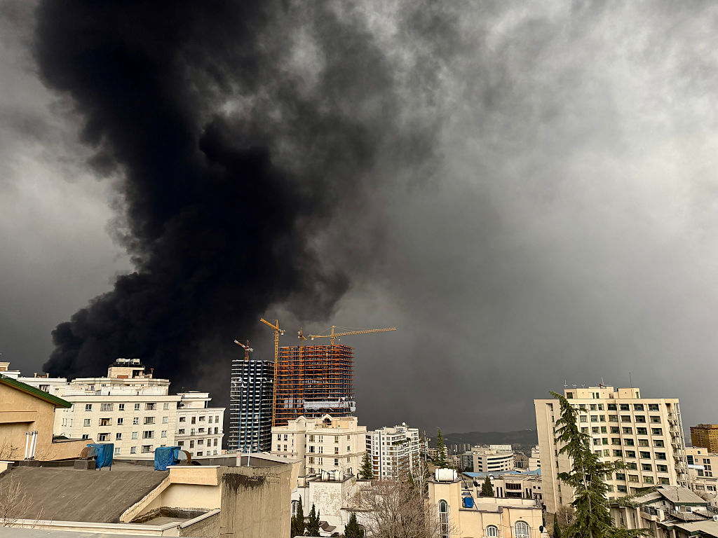 US-Israel Strikes on Tehran Oil Depots Blanket City in Smoke