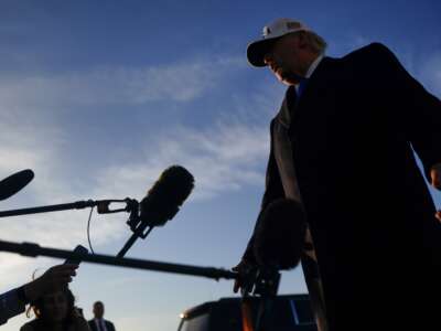 Donald Trump speaks to the media before boarding Air Force One on March 13, 2026, at Joint Base Andrews, Maryland.