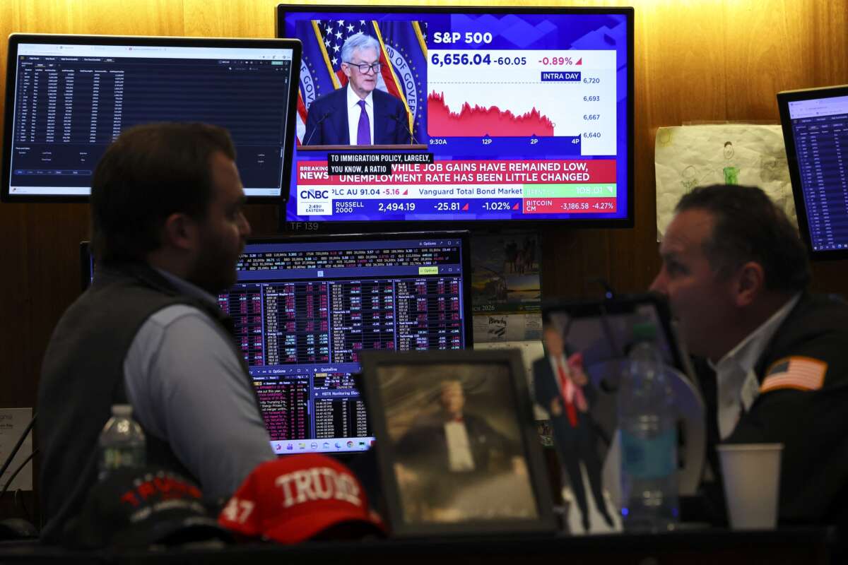 A livestream shows Jerome Powell, chairman of the U.S. Federal Reserve, speaking after a Federal Open Market Committee meeting, on the floor of the New York Stock Exchange in New York City on March 18, 2026.