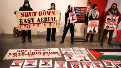 Protesters with Demilitarize Brooklyn Navy Yard occupy Building 77 at the Brooklyn Navy Yard during the February 11 BNYDC Board meeting.