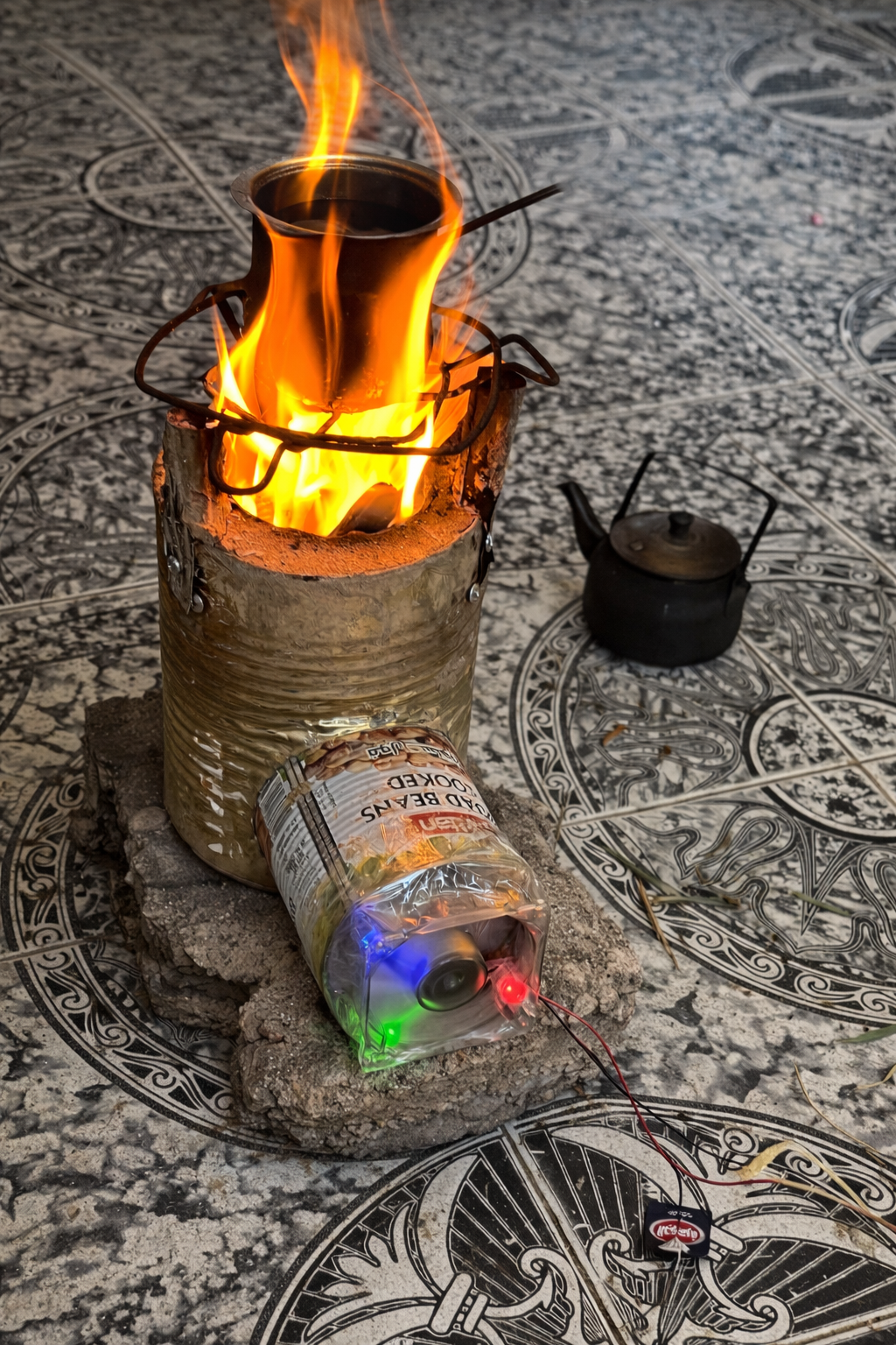 Our alternative to gas cooking, crafted from reused food tins and proven to be an effective solution.