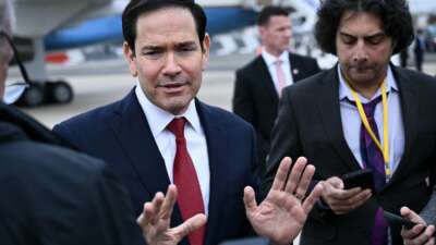U.S. Secretary of State Marco Rubio gestures as he speaks to the press following a G7 Foreign Ministers' meeting with partner countries before his departure at the Bourget airport in Le Bourget, outside Paris, on March 27, 2026.